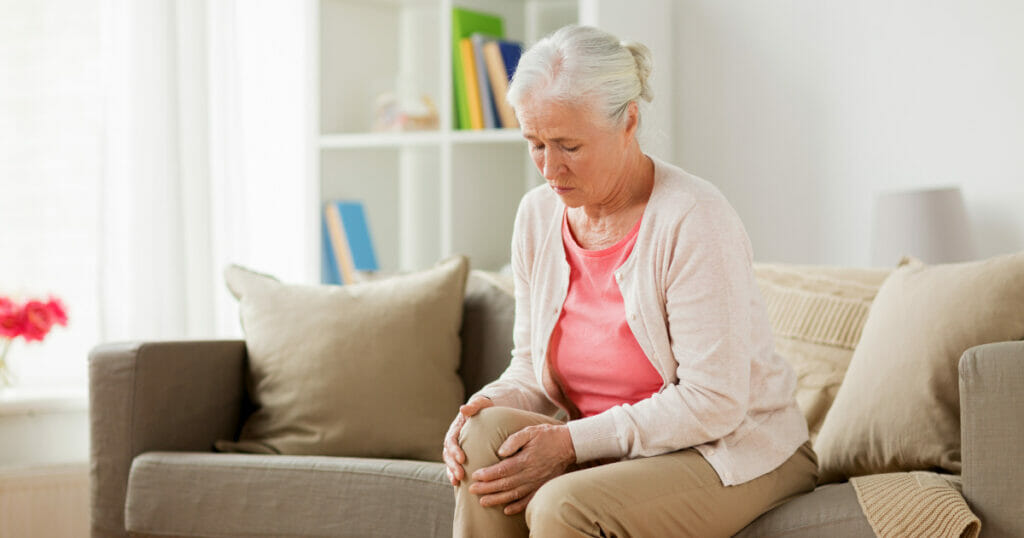 Rheumatoid arthritis senior woman