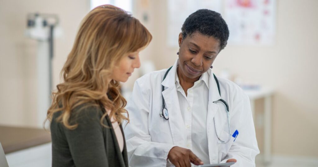 woman talking to her doctor
